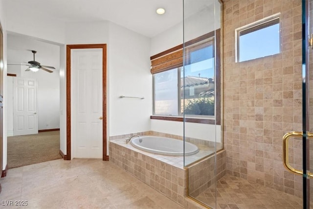 full bath with a ceiling fan, a stall shower, tile patterned flooring, and a garden tub