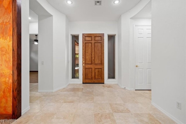 entrance foyer with visible vents, baseboards, and recessed lighting