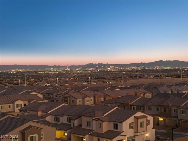 aerial view at dusk with a mountain view