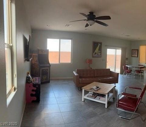 living room featuring ceiling fan