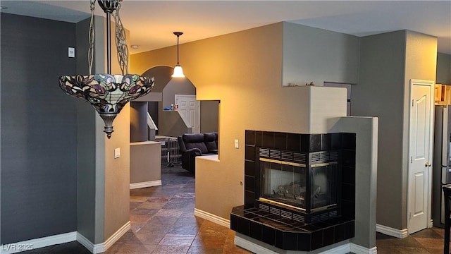 kitchen with a tile fireplace