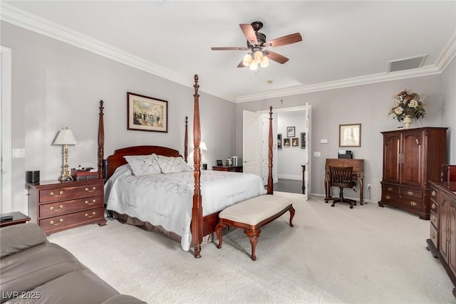 carpeted bedroom featuring ceiling fan and crown molding