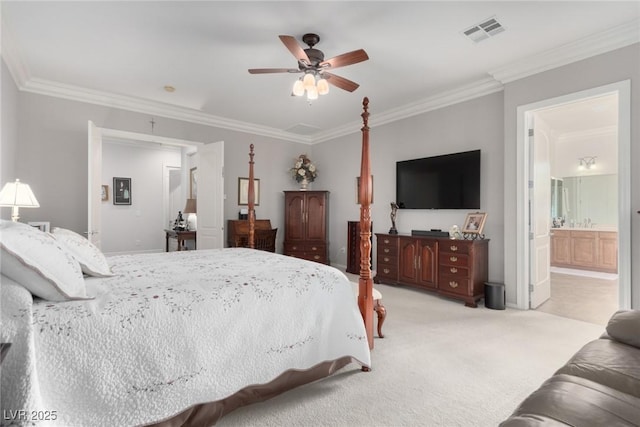 carpeted bedroom featuring connected bathroom, ceiling fan, and crown molding