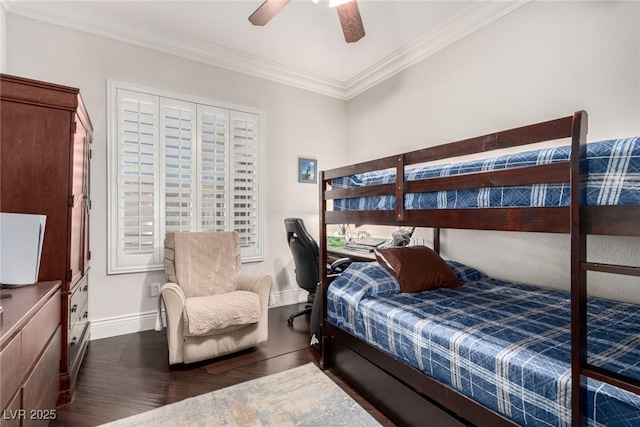 bedroom with ceiling fan, dark hardwood / wood-style flooring, and ornamental molding