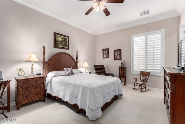 bedroom featuring ceiling fan, light colored carpet, and ornamental molding