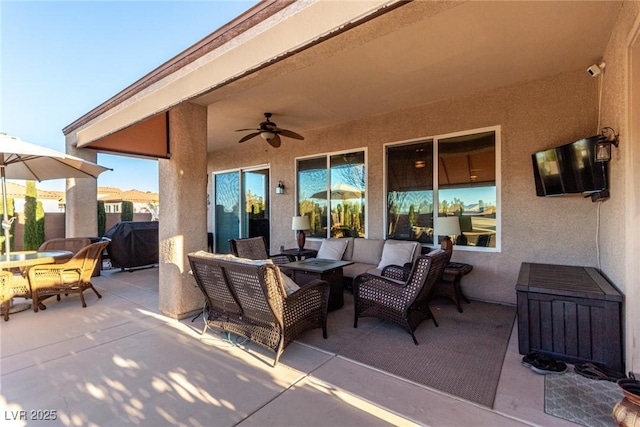 view of patio with outdoor lounge area, ceiling fan, and grilling area