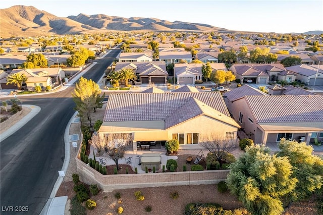 drone / aerial view featuring a mountain view