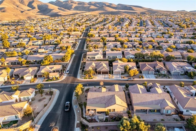 drone / aerial view featuring a mountain view