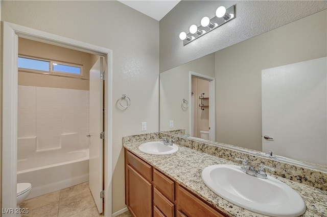 full bathroom with shower / bathing tub combination, vanity, and toilet