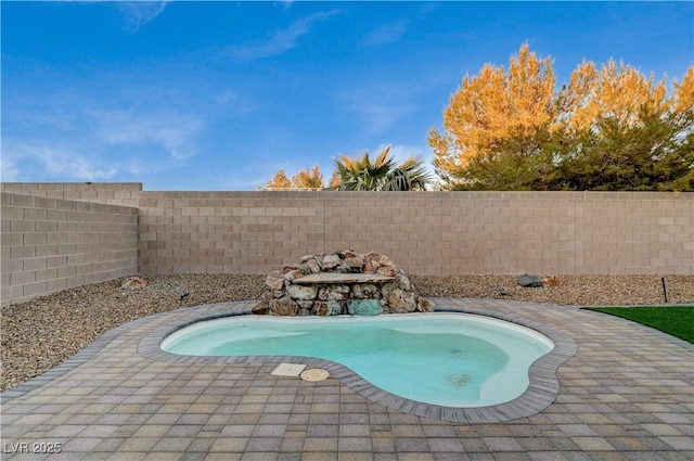 view of pool with a patio