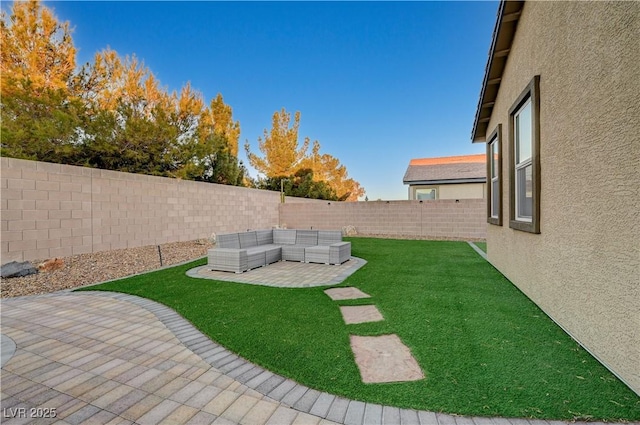 view of yard featuring a patio area and outdoor lounge area