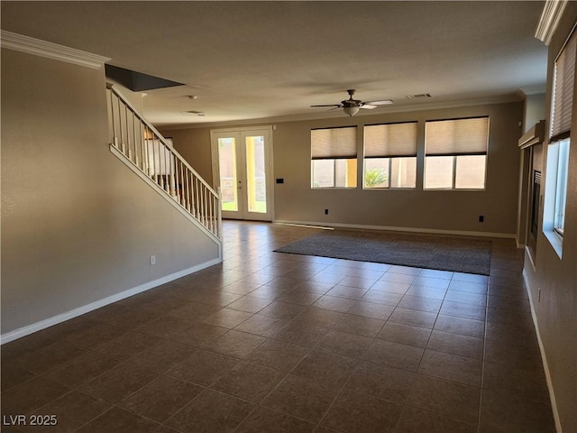 interior space with french doors, ceiling fan, and ornamental molding