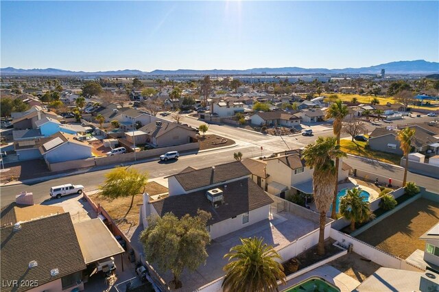 bird's eye view with a mountain view