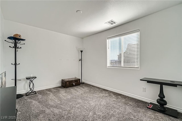 empty room with carpet flooring