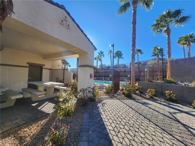 view of patio / terrace with a community pool