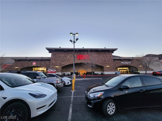 view of parking at dusk