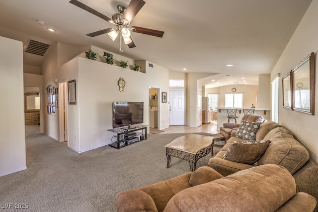 living room featuring ceiling fan and light carpet