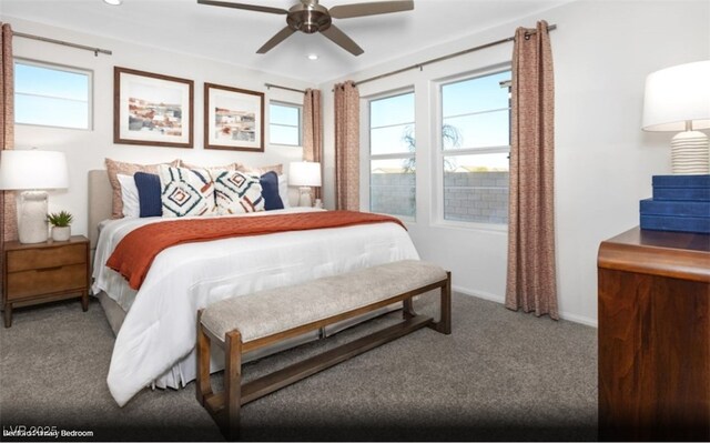 bedroom featuring ceiling fan and carpet floors