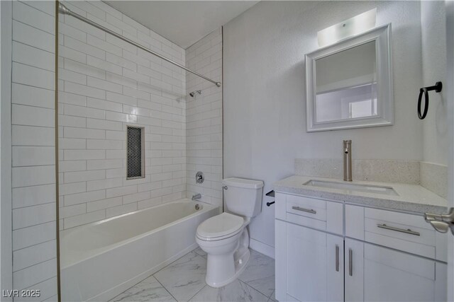 full bathroom with vanity, toilet, and tiled shower / bath combo