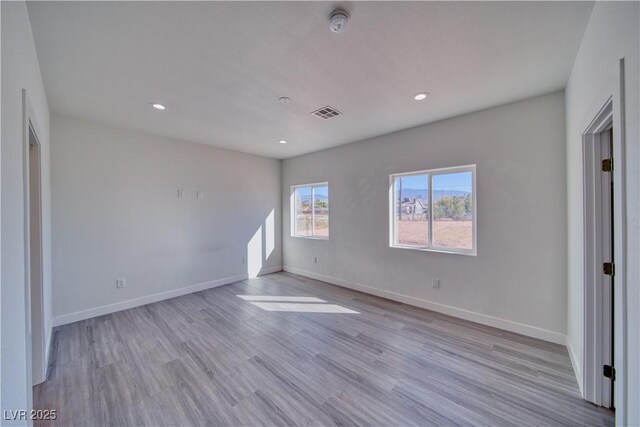 unfurnished bedroom featuring light hardwood / wood-style flooring