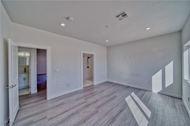 empty room featuring light hardwood / wood-style flooring