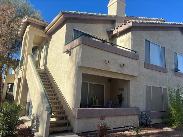 exterior space featuring a balcony