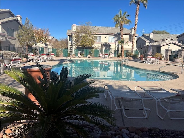 view of pool featuring a patio area