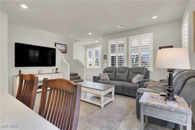 living room with light tile patterned floors