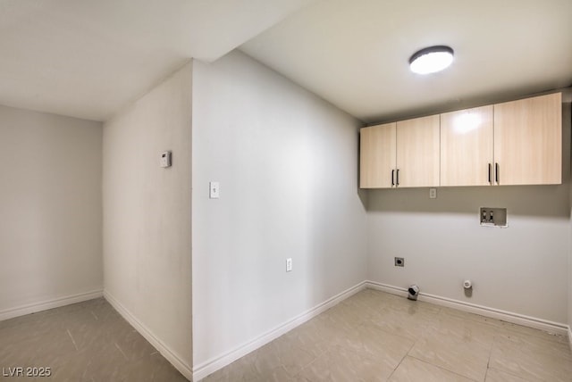 laundry area featuring cabinets, hookup for a washing machine, hookup for a gas dryer, and electric dryer hookup