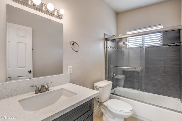 full bathroom with vanity, toilet, and enclosed tub / shower combo