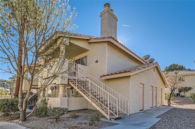 view of property exterior with a garage