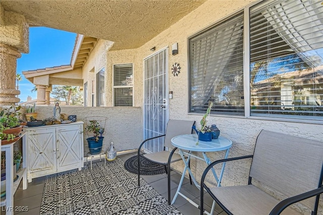 view of patio with a balcony