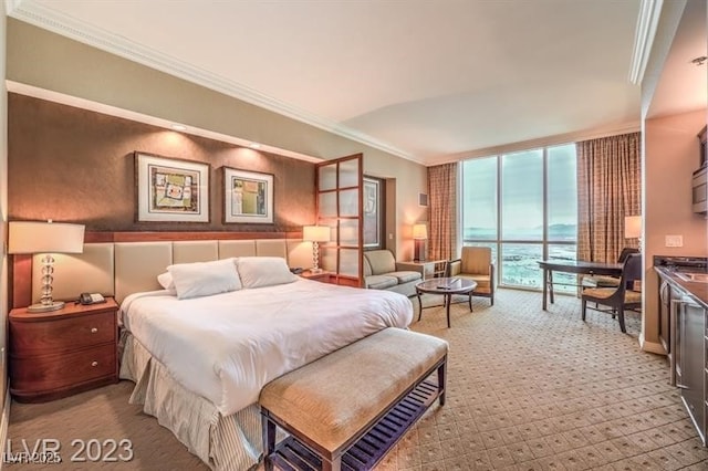 bedroom with access to exterior, crown molding, light colored carpet, and a wall of windows