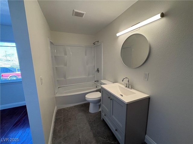 full bathroom with toilet, vanity, and bathing tub / shower combination