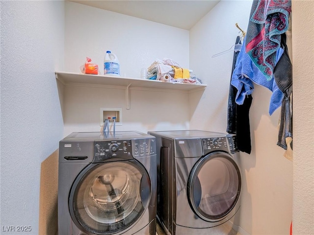 laundry room featuring washer and clothes dryer