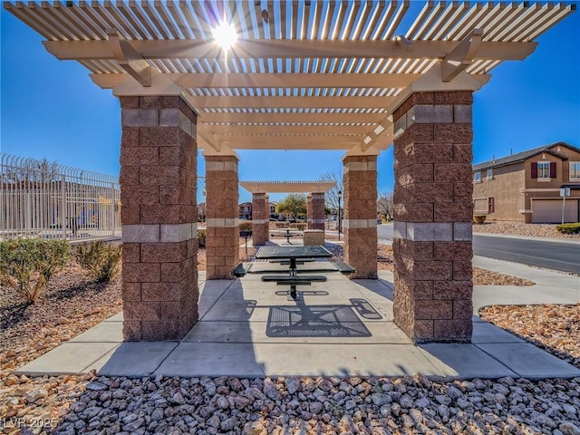 view of patio featuring a pergola