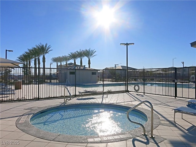 view of pool featuring a patio area