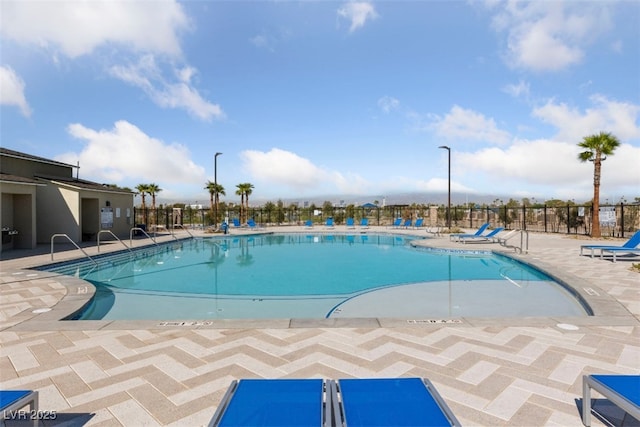 view of swimming pool with a patio area