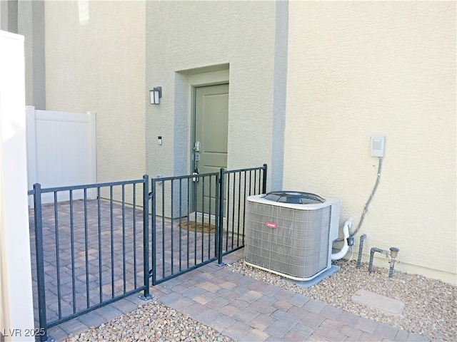 view of patio featuring central AC