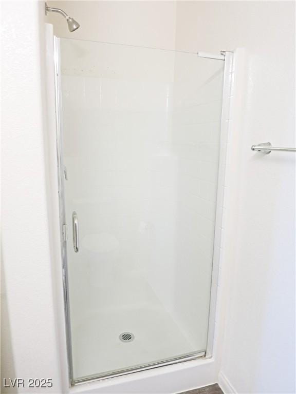 bathroom with an enclosed shower