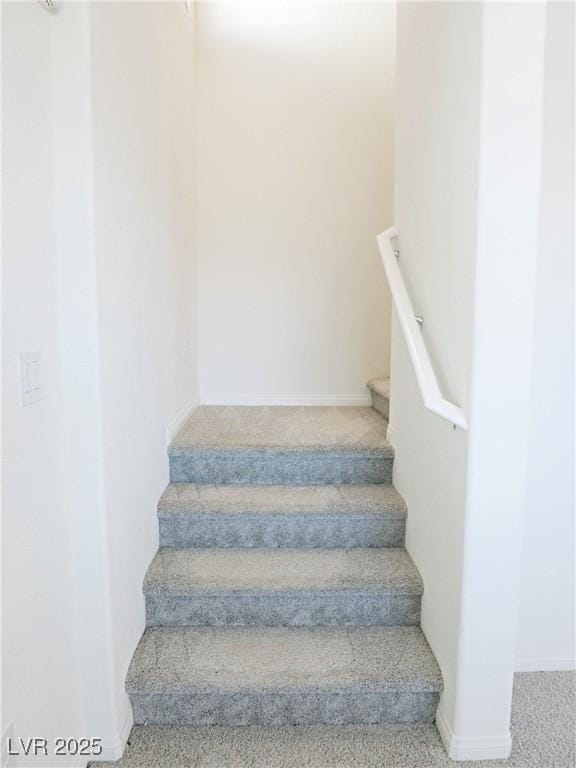 stairs with carpet floors