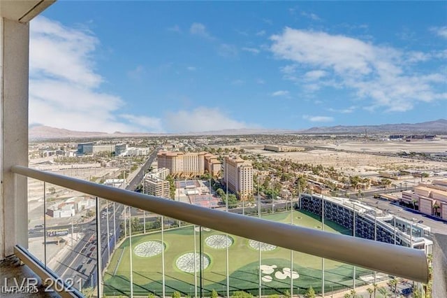 balcony featuring a mountain view