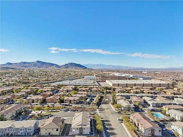 bird's eye view with a mountain view