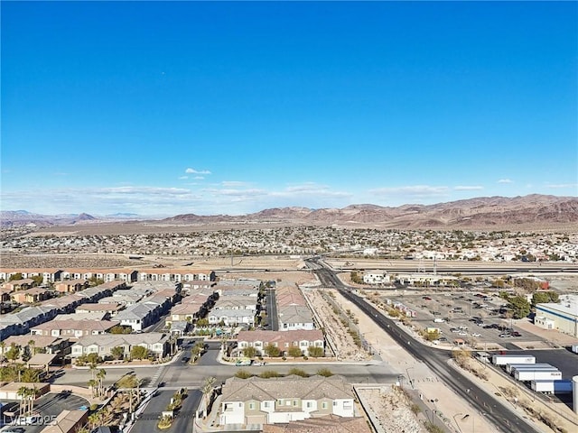 drone / aerial view featuring a mountain view