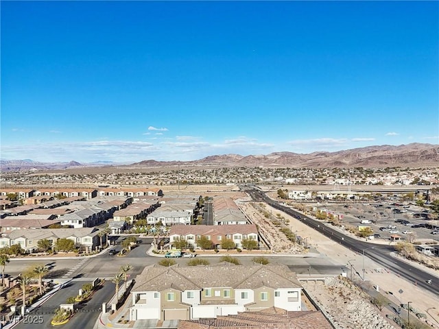 bird's eye view with a mountain view