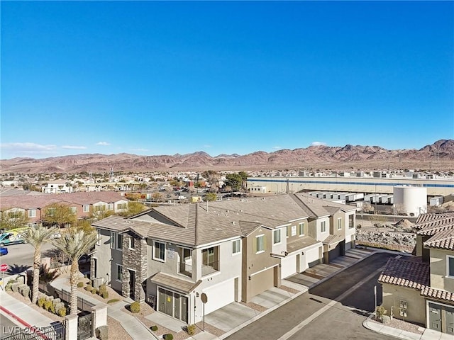 drone / aerial view featuring a mountain view