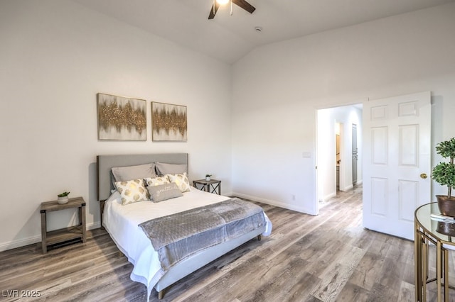 bedroom with lofted ceiling, wood-type flooring, and ceiling fan