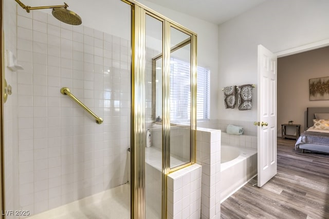 bathroom with hardwood / wood-style flooring and plus walk in shower