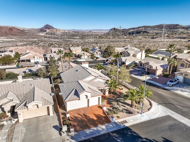 drone / aerial view featuring a mountain view