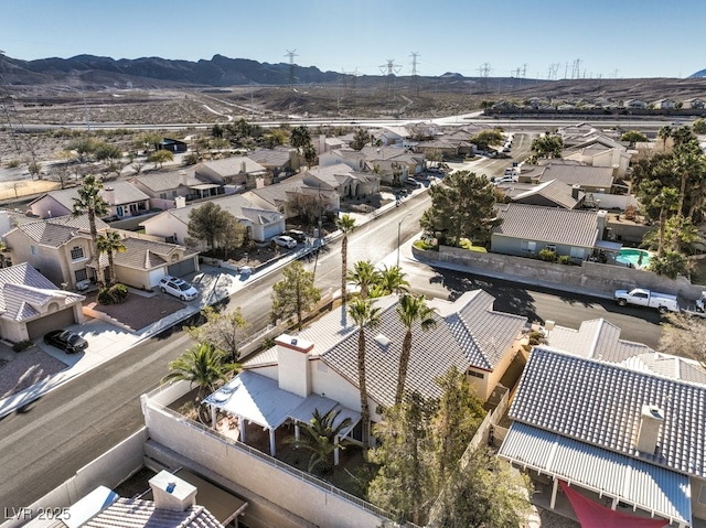 drone / aerial view featuring a mountain view